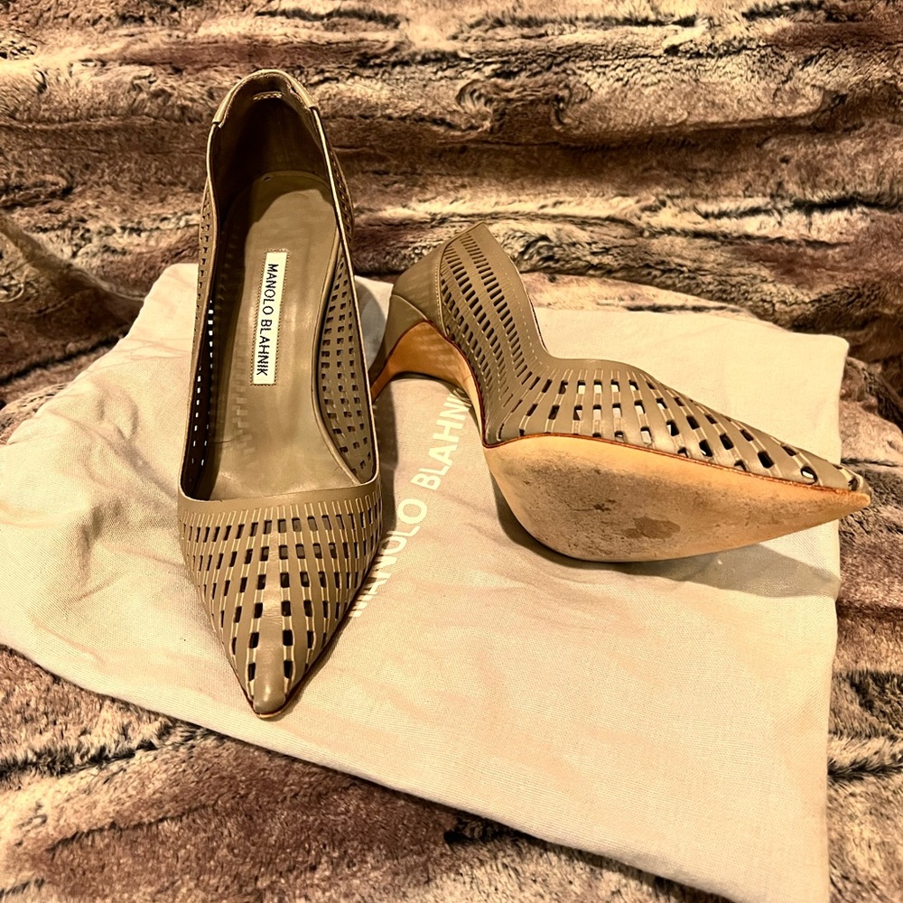 Manolo Blahnik pumps 7 1/2. Greyish color. Perfect condition.